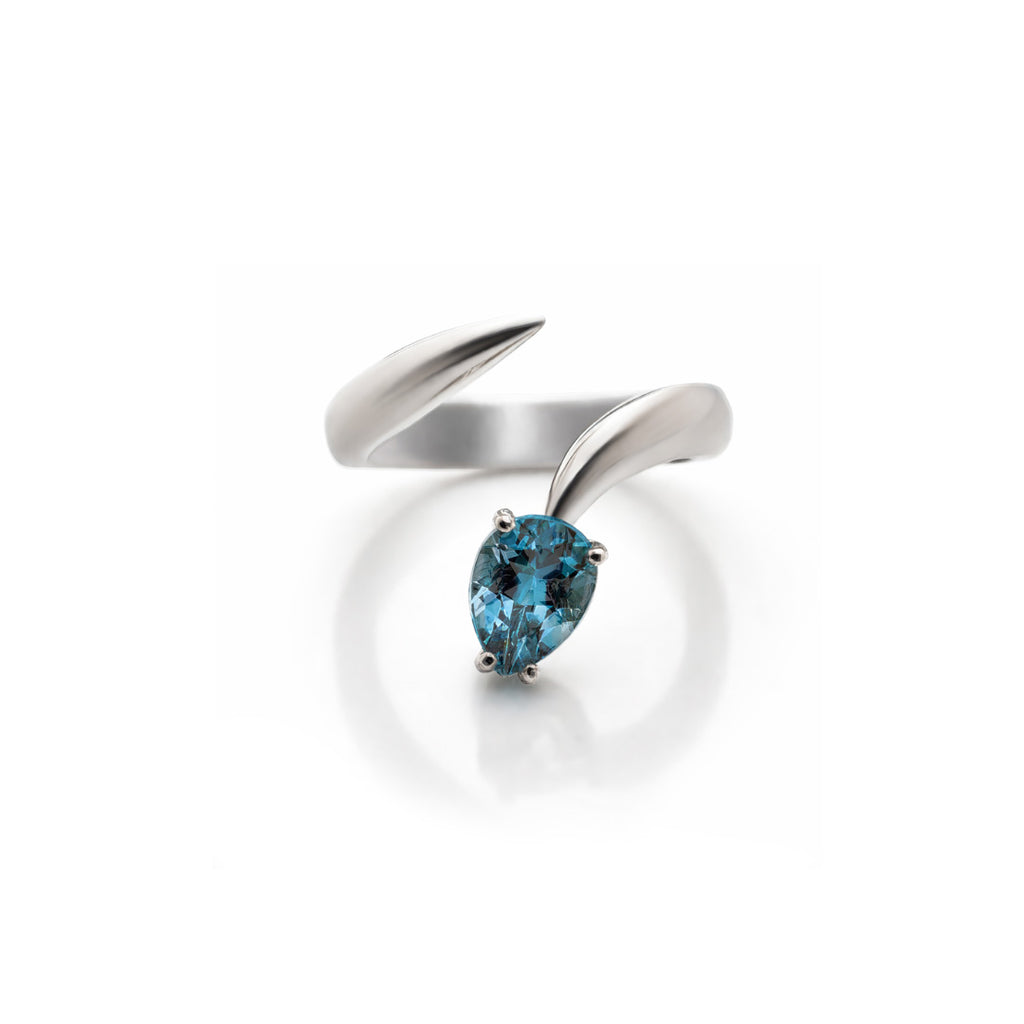 CLAW SWISS TOPAZ RING